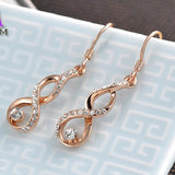 Infiniti Gold Plated Clear Earrings
